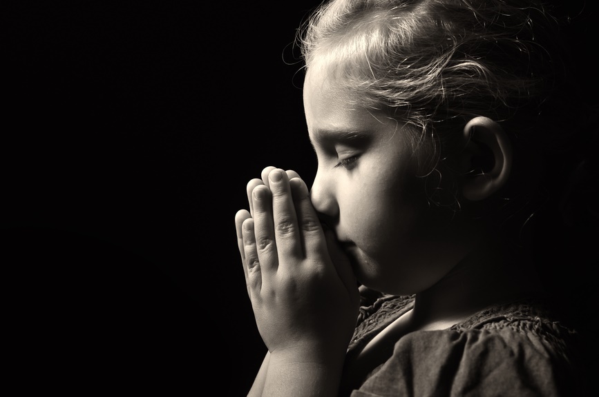 Praying child.